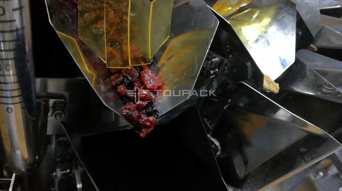 Zのエレベーターのコンベヤーの季節の豆の干しぶどうピーナツ軽食の米のためのフル オートマチックの重量を量るパッキング機械