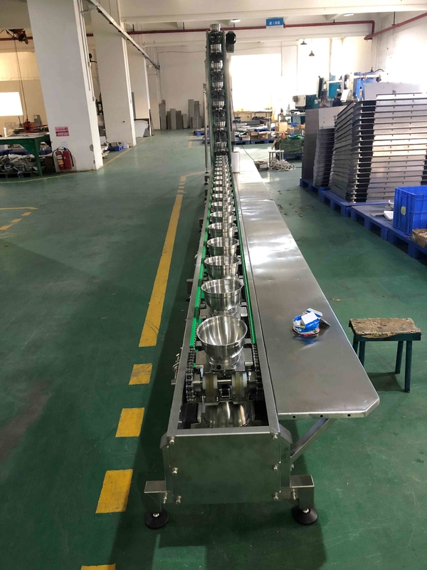 0.75KWピクルスの包装機械測定可能な食糧パッチのブロックのための安全なボールのタイプTipplersのコンベヤー